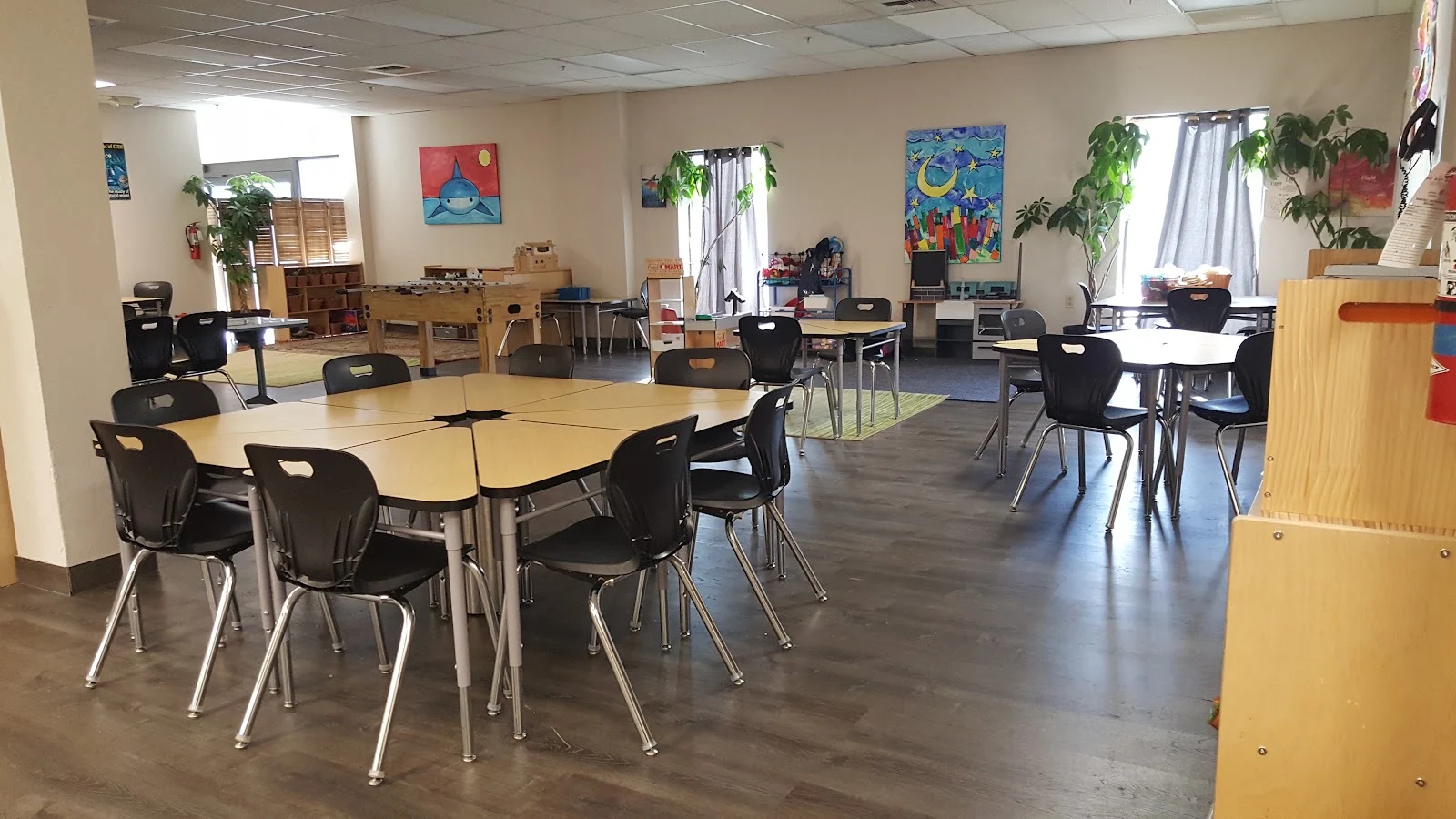 Art and reading corner with jungle mural School-age classroom at Ascend To The Heights before and after school program in Spokane